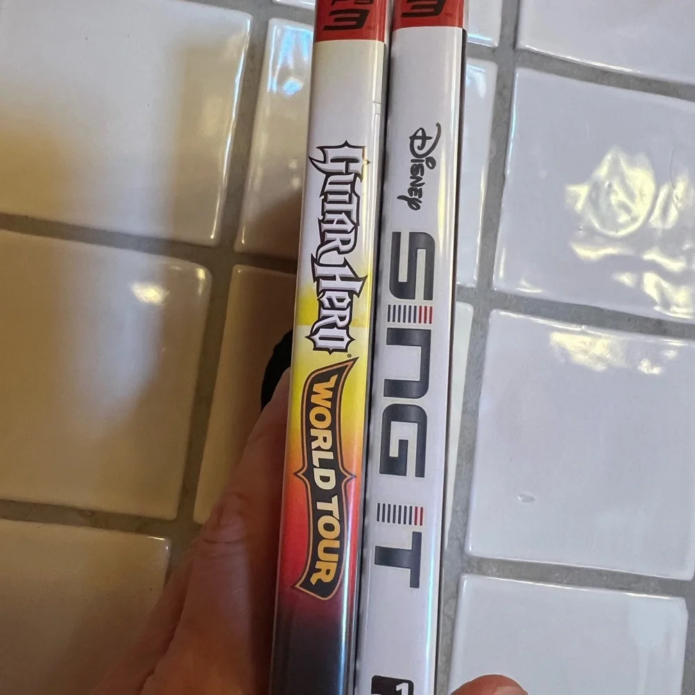 Sony Black guitar hero, and Disney sing it Video Games Collection